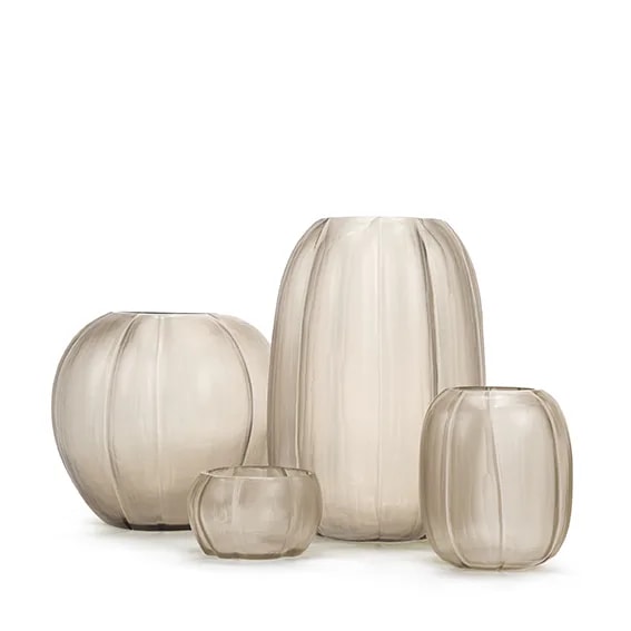 Four smoke grey glass vases of different heights grouped together, including the round LALIBELA M