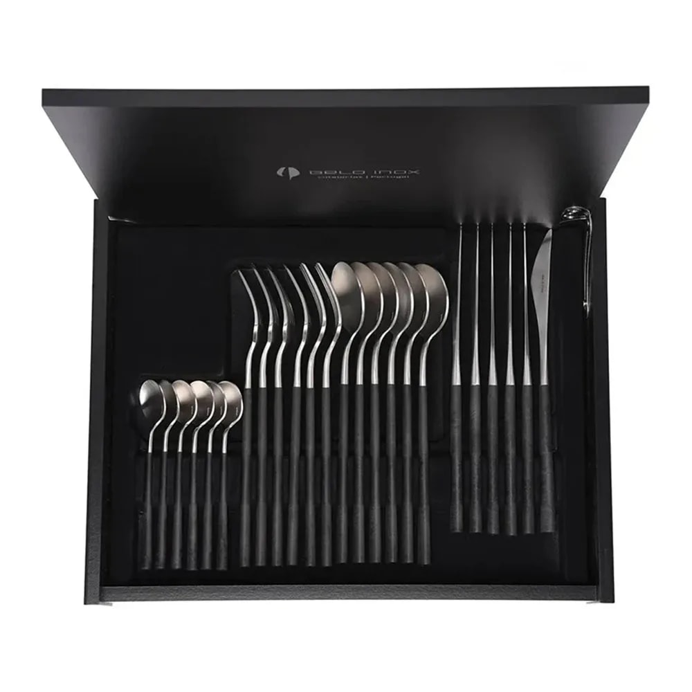 Open black presentation box with the full 24-piece Neo Black cutlery set in fitted foam, seen from above