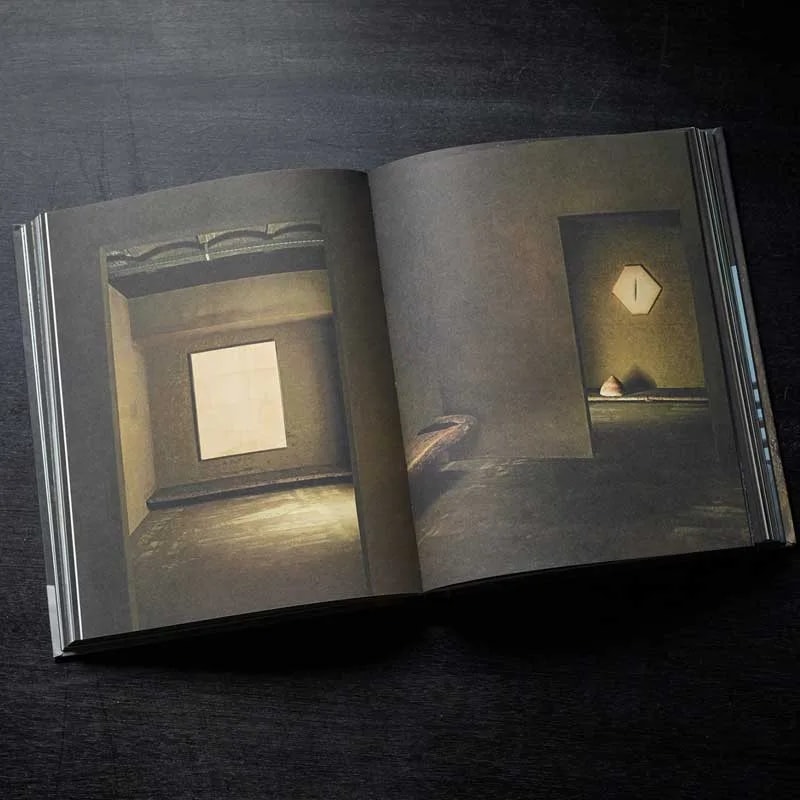 Wabi Inspirations spread with two shadowy interior photographs of niches lit by soft daylight