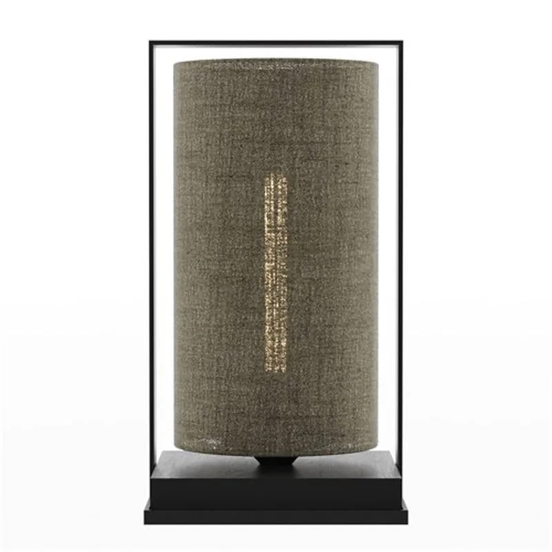 Tube Wood Fabric 40 table lamp with an olive woven cylinder shade in a black frame on a dark wooden base, lit
