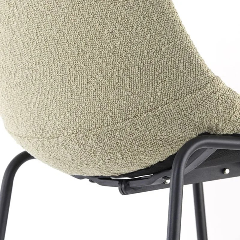 Detail of the curved boucle backrest and underseat fixings of the JEDDO bar chair, showing the weave