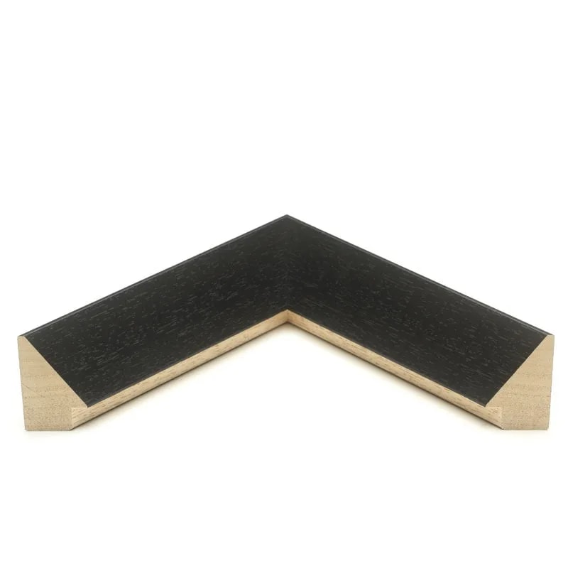 Wide black frame moulding corner sample for the Classic Car I print, with visible grain and pale wood edges